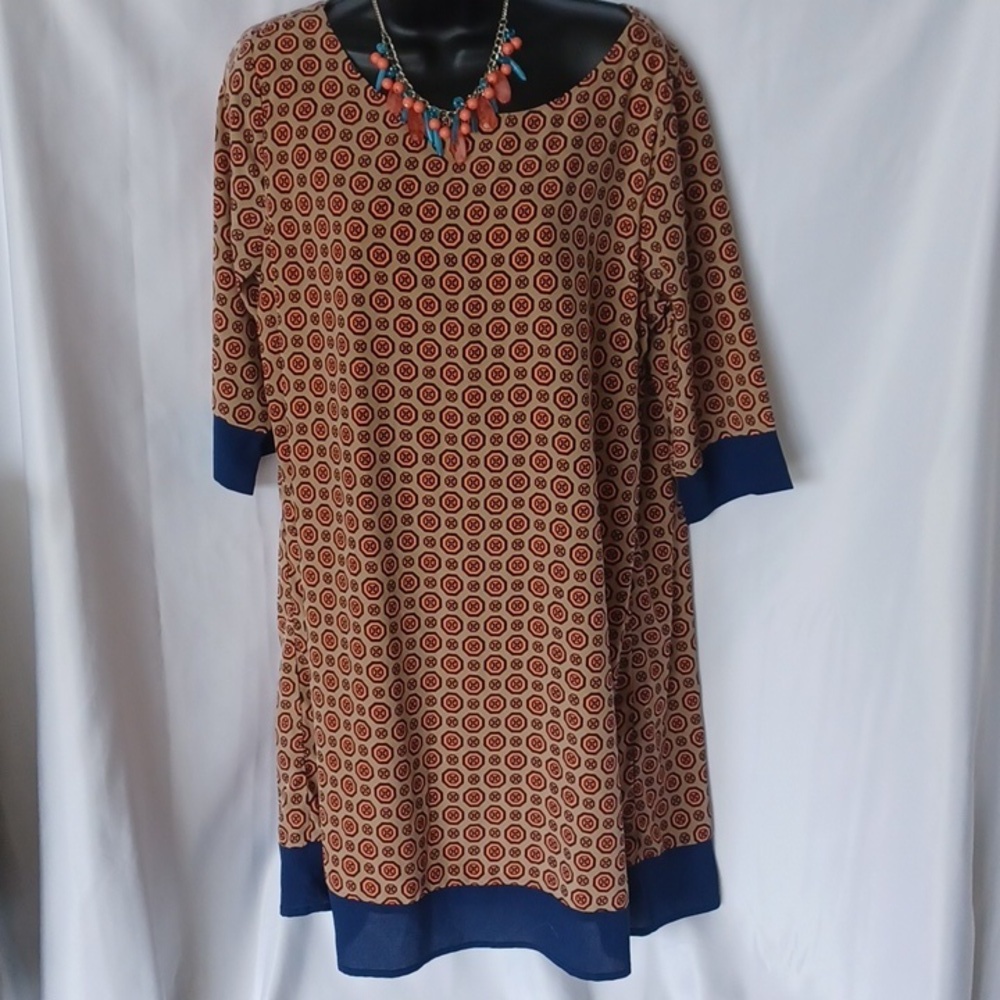 Caramela Fun patterned dress tan blue and peach